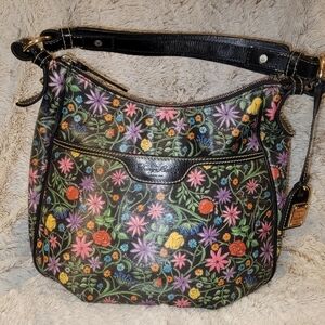 Dooney and Bourke black and multicolored bag with rainbow colored zipper.